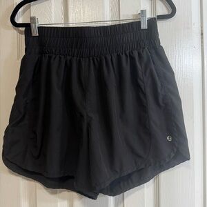 Legend women’s workout shorts. Side slits. Wide elastic waist. Thin inner lining